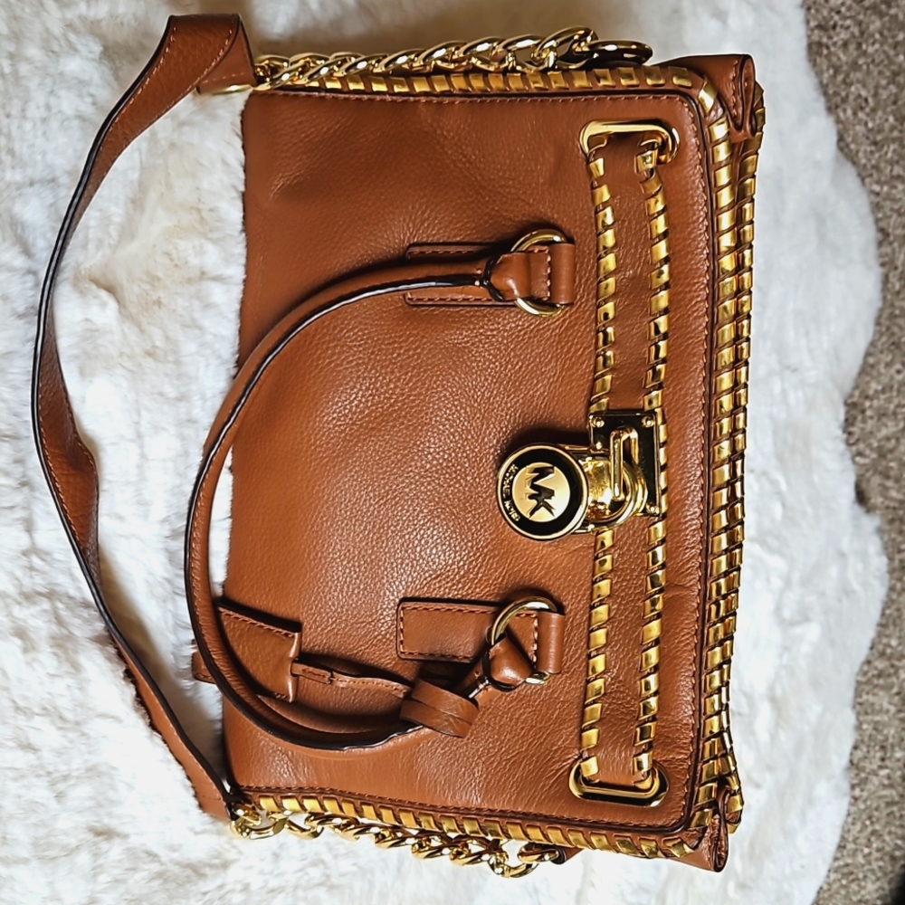 Michael Kors purse Brown and gold medium size.